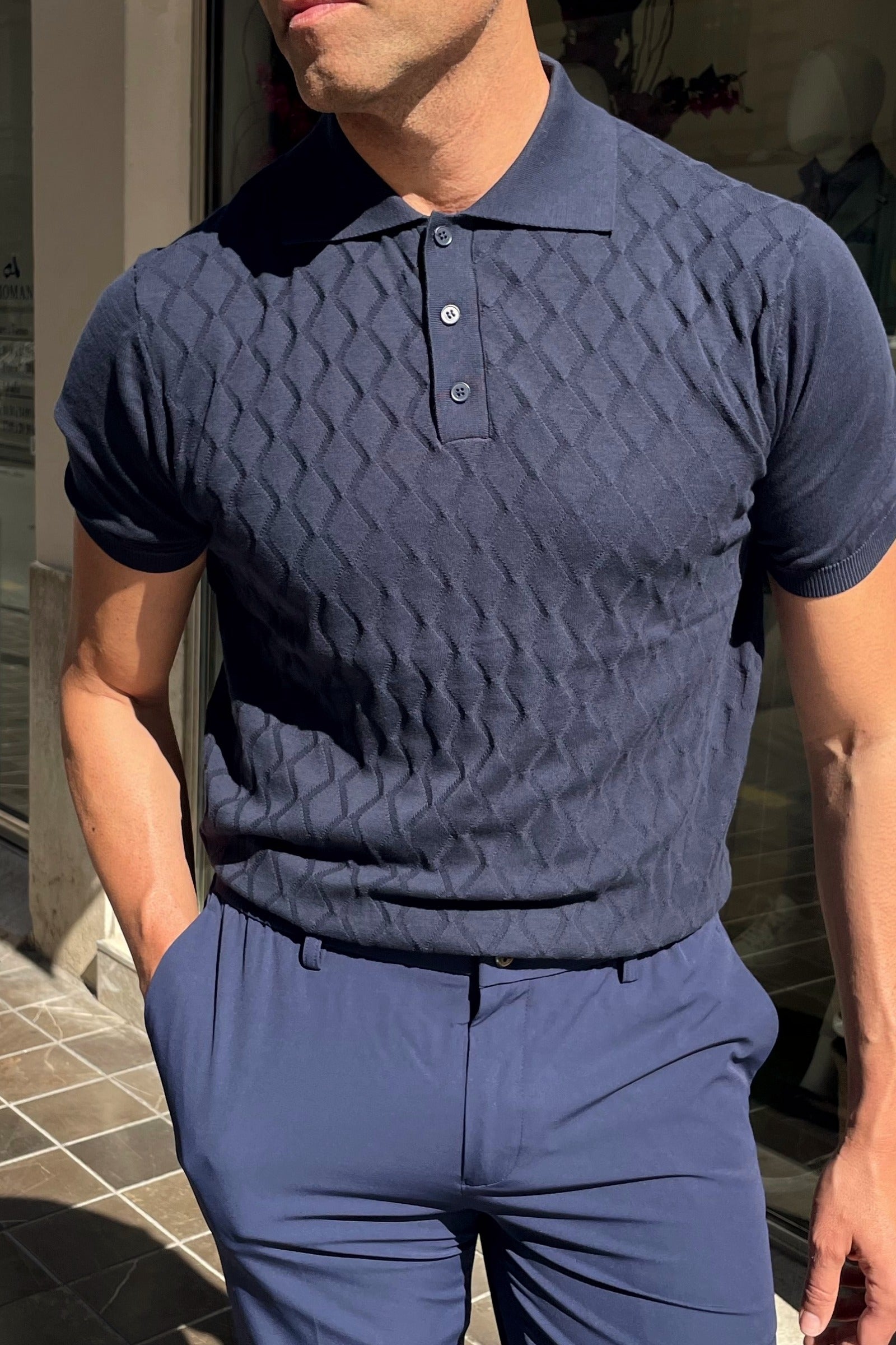 Polo italiano de punto para hombre en color azul marino.